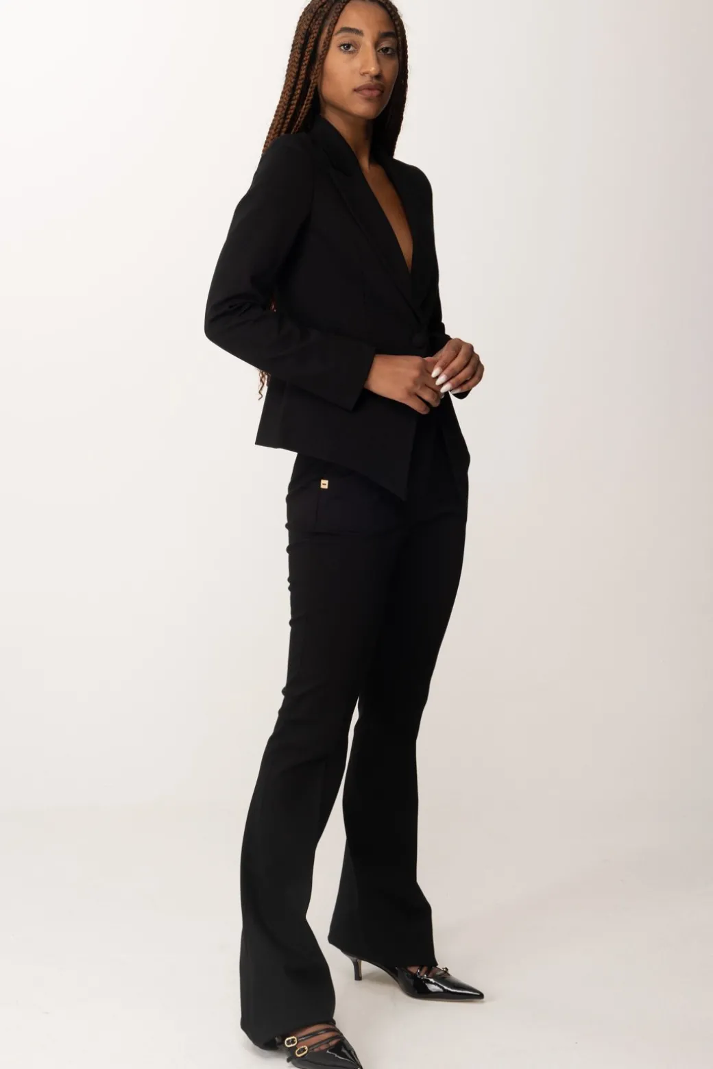 Donna Manila Grace Pantaloni a Zampa con Placca Logo